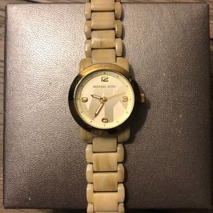 Ladies Michael Kors gold and horn watch